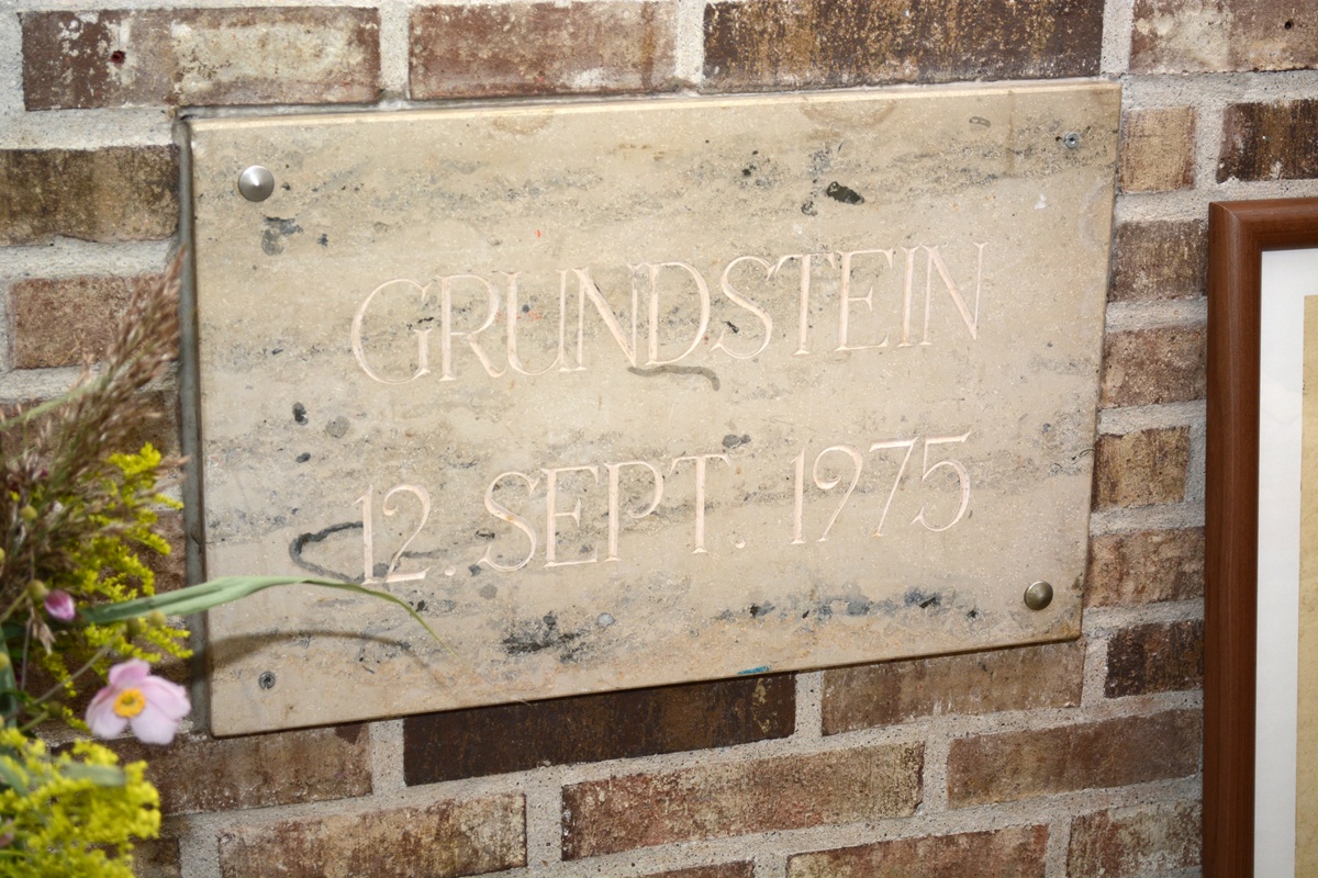 Grundstein in der Mauer